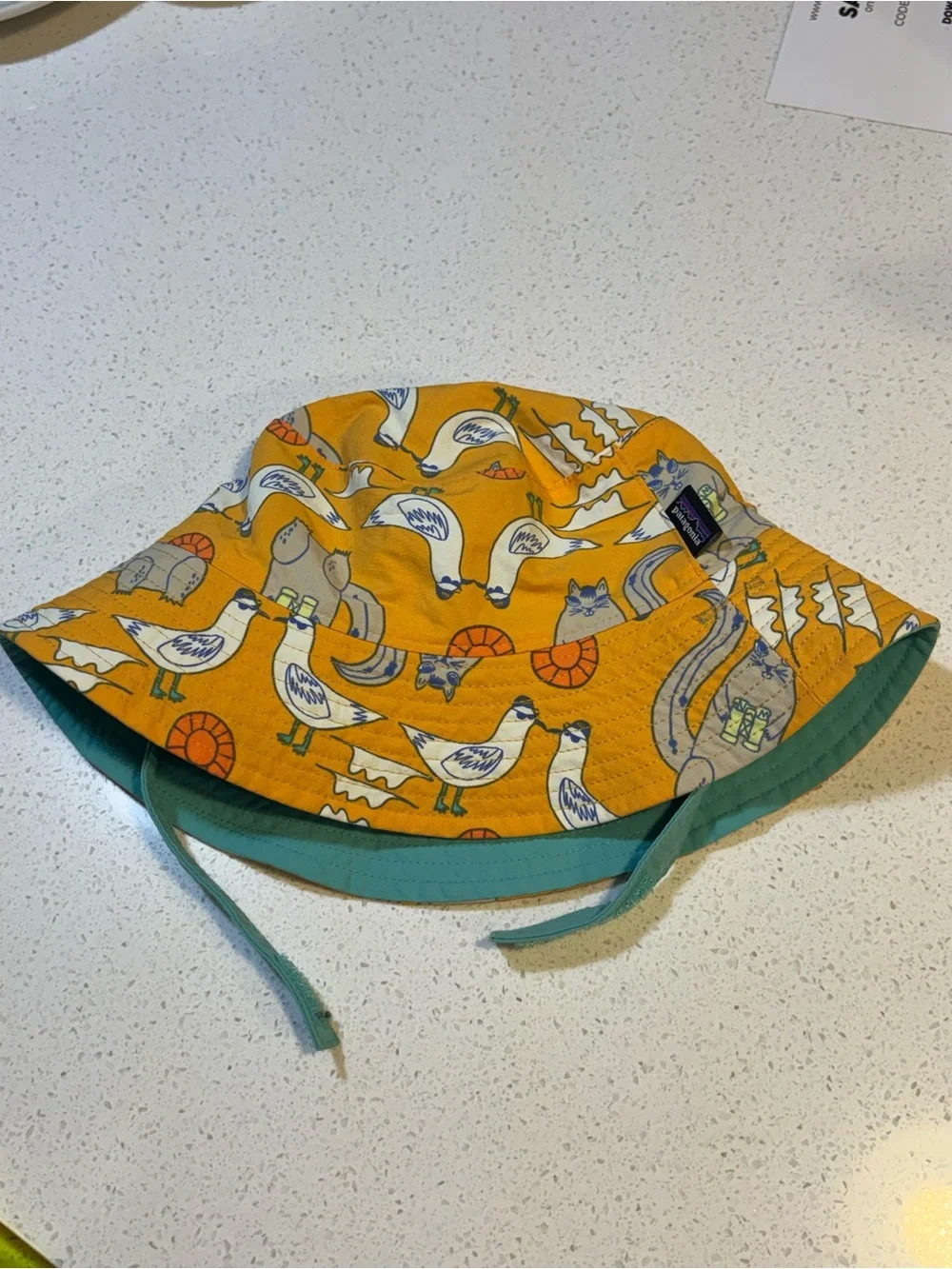 Patagonia Reversible Kids Sun Bucket Hat in Yellow with Teal Lining